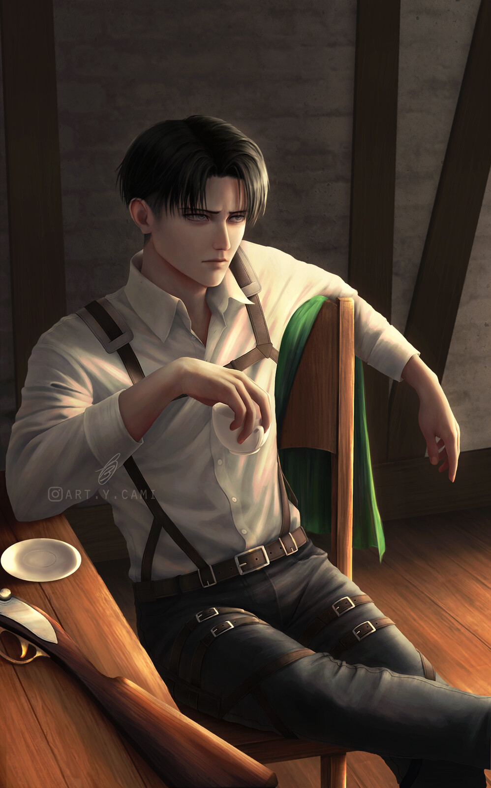 levi holding a teacup