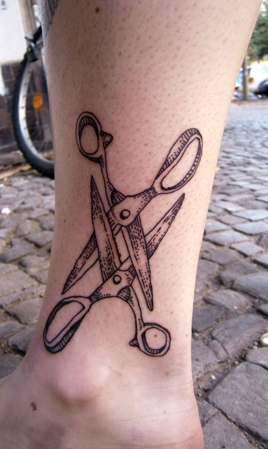 Scissors on sale symbol meaning